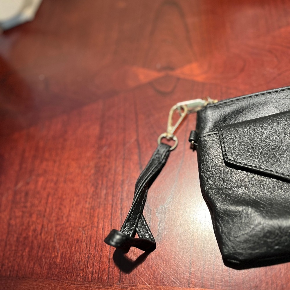 Chic Black Crossbody Bag with Tassel Detail - Picture 8 of 10